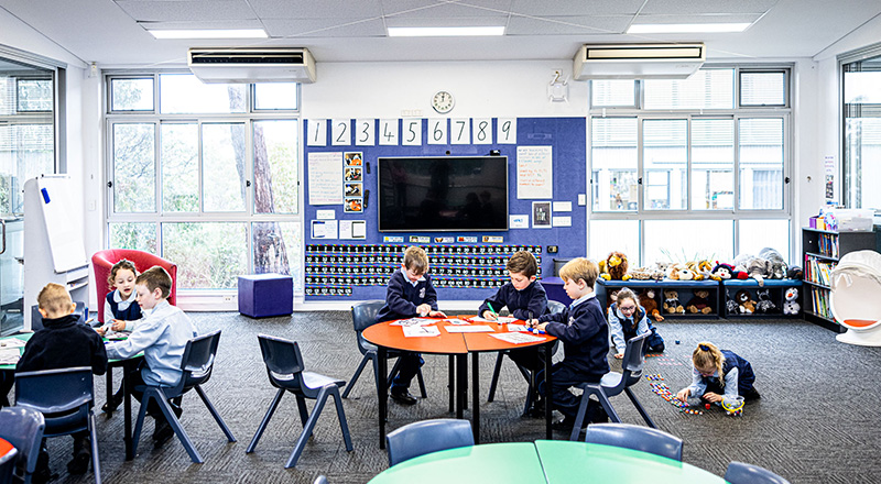 Students making use of classroom resources on offer at Our Lady of the Nativity Primary Lawson