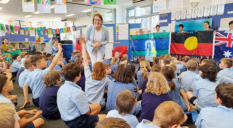 Teacher with class at Our Lady of the Nativity Primary Lawson