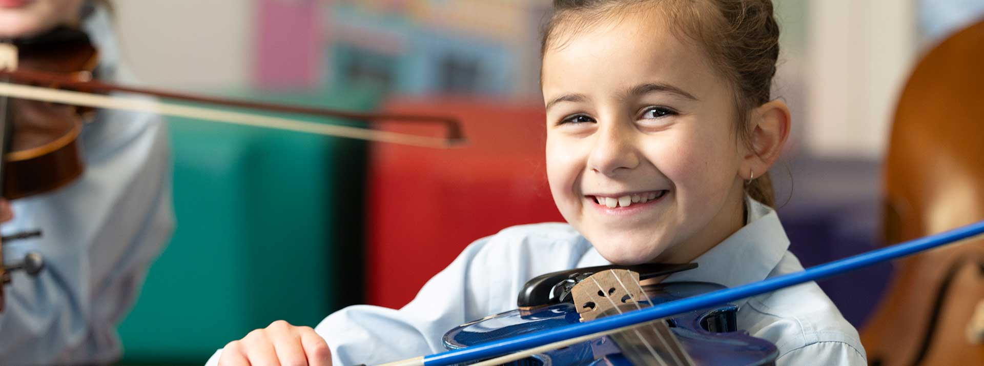 Our Lady of the Natvity Lawson student playing viola