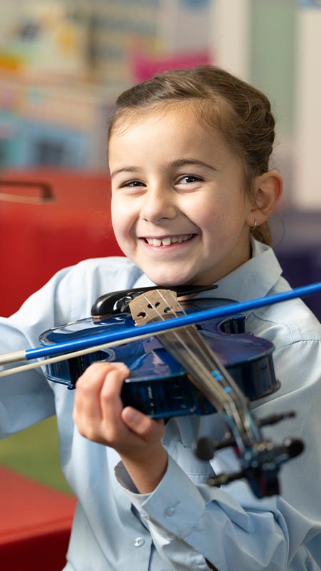 Our Lady of the Natvity Lawson student playing viola