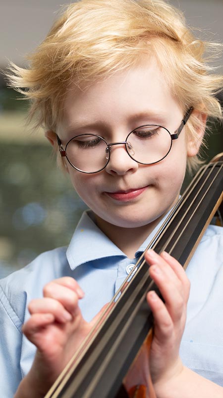 Our Lady of the Nativity Primary Lawson student playing Cello