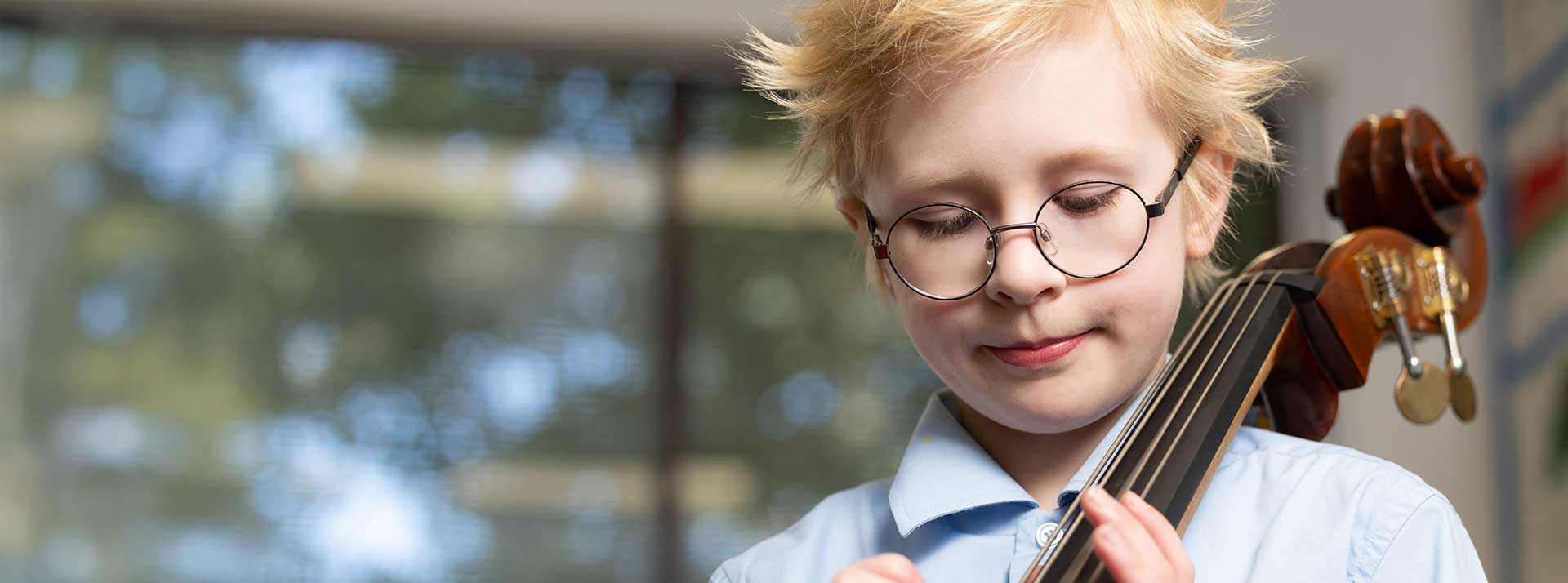 Our Lady of the Nativity Primary Lawson student playing Cello