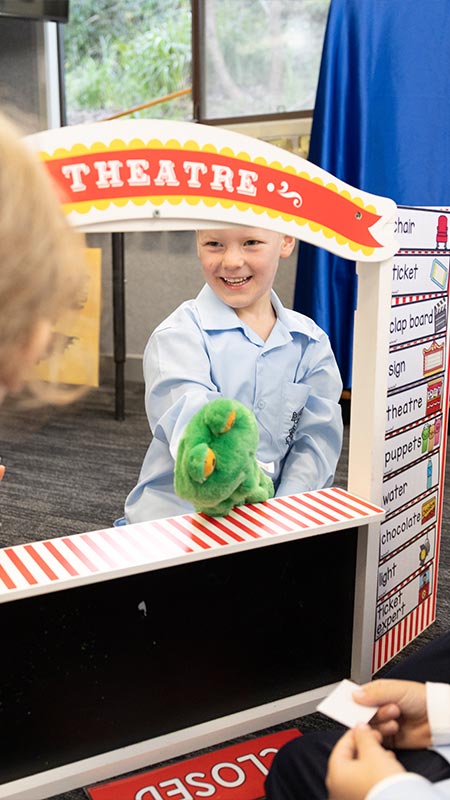 OLN Lawson Students performing play theatre with hand puppets