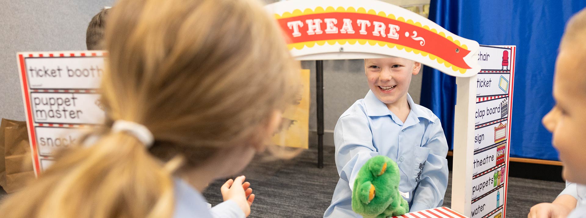 OLN Lawson Students performing play theatre with hand puppets