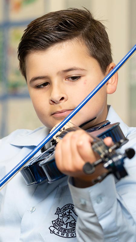 OLN Lawson Student playing string instrument