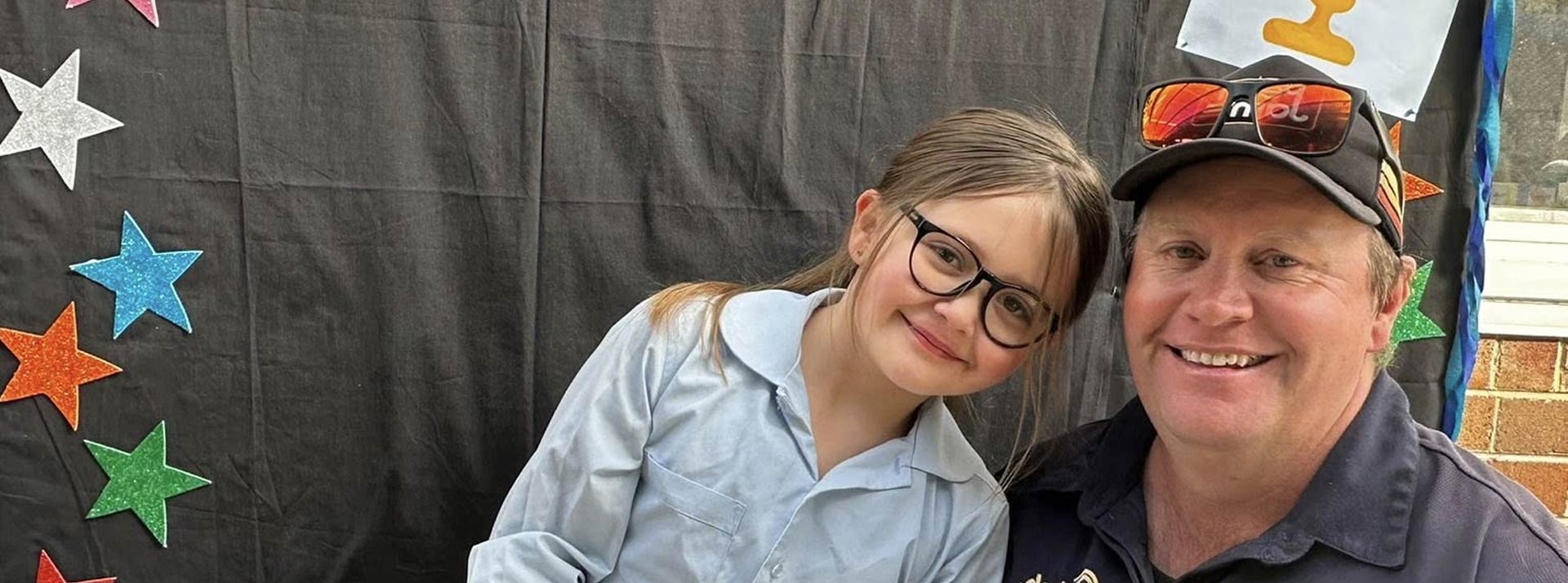 Dad and daughter at Our Lady of the Nativity Lawson