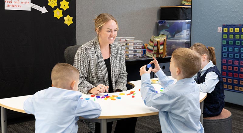 OLN Lawson teacher assisitng students