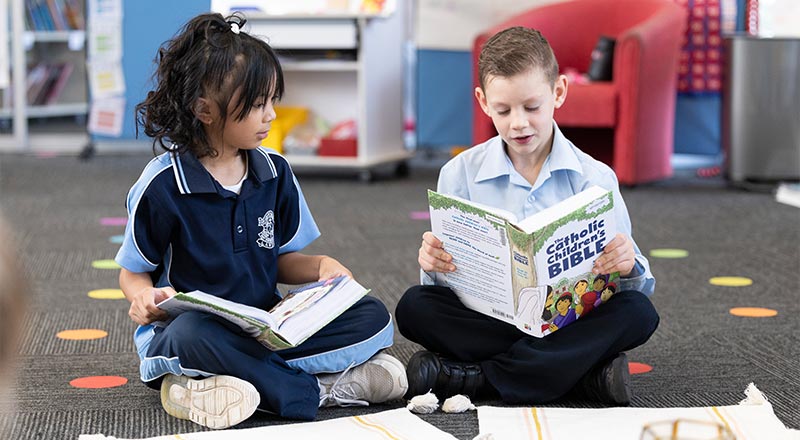 OLN Lawson students reading the Bible