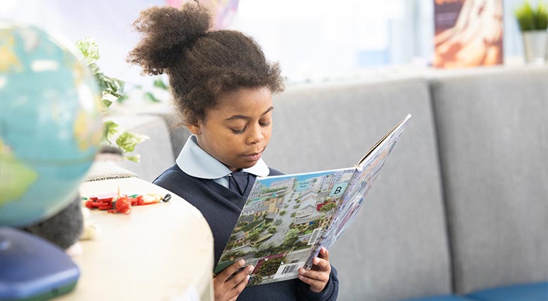 OLN Lawson student reading from book