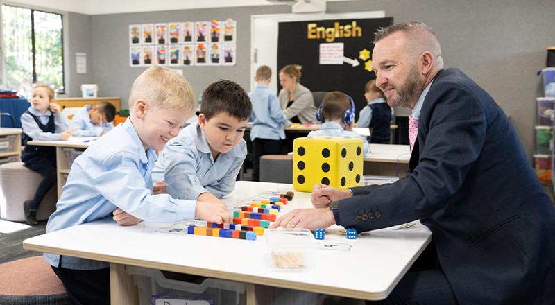 Learning spaces available at Our Lady of the Nativity Primary Lawson. Principal Matthew Bond assisting students.