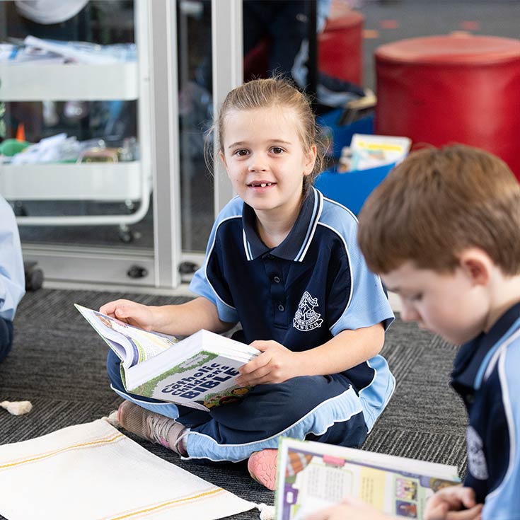 OLN Lawson student reading The Children's Bible